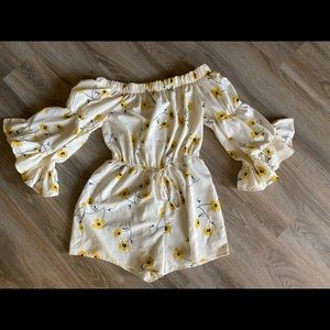 Flower Romper w/ shorts on the bottom and a tie